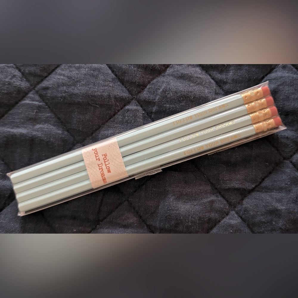 Follow Your Dreams. Set of light blue pencils with gold lettering.